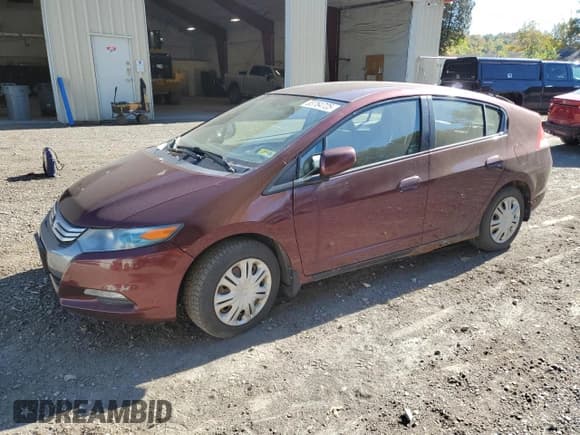 ✅ 2011 Honda Insight • VIN: JHMZE2H38BS007545 • Lot: 83764725. Listed on Copart with 133,750 mi. Free auction sales archive from the USA and detailed vehicle history report at DreamBid. Image 1.