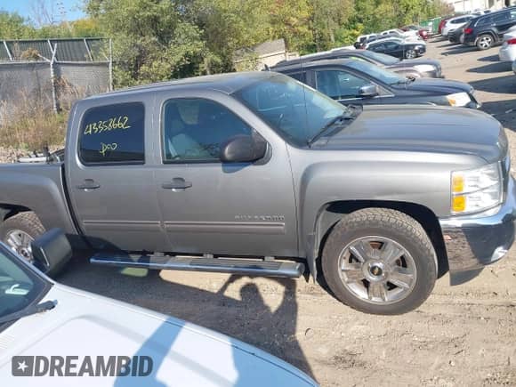 2012 Chevrolet Silverado 1500 LT z VIN 1GCPKSE7XCF216465, wystawiony jako IAAI lot #43358662 z przebiegiem 171 734 mil mil oraz . Historia ofert i sprzedaży dostępna na DreamBid. Obrazek 13.