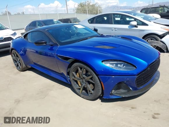 ✅ 2019 Aston Martin DBS Superleggera • VIN: SCFRMHAV4KGR00755 • Лот: 43236782. Опубликован ранее на IAAI с пробегом 18 962 миль. Бесплатный доступ к архиву аукционных продаж из США и подробный отчёт об истории автомобиля на DreamBid. Изображение 1.