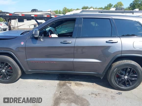 2017 Jeep Grand Cherokee Trailhawk with VIN 1C4RJFLG6HC718727, listed as a IAAI auction lot 43277148 with 92,337 mi miles and . Bid and sale history available at DreamBid. Image 14.