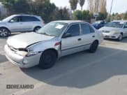✅ 1999 Toyota Corolla LE • VIN: 1NXBR12E7XZ221588 • Lot: 43836707. Wystawiony na IAAI z przebiegiem 295 529 mil. Bezpłatny archiwum sprzedaży aukcyjnych z USA i szczegółowy raport historii pojazdu na DreamBid. Zdjęcie 2.