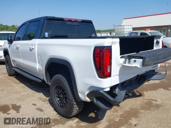 ✅ 2023 GMC Sierra 1500 AT4X • VIN: 3GTUUFEL7PG182765 • Лот: 43018136. Опубликован ранее на IAAI с пробегом 52 888 миль. Бесплатный доступ к архиву аукционных продаж из США и подробный отчёт об истории автомобиля на DreamBid. Изображение 3.