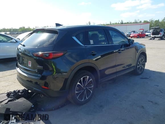 ✅ 2022 Mazda CX-5 S Premium • VIN: JM3KFBDMXN0620059 • Lot: 42114798. Listed on IAAI with 19,602 mi. Free auction sales archive from the USA and detailed vehicle history report at DreamBid. Image 4.
