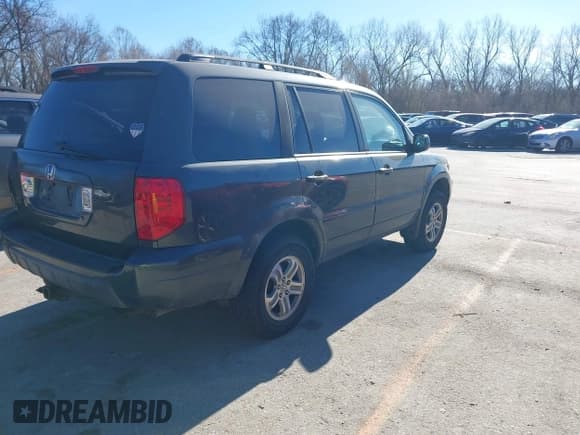 ✅ 2003 Honda Pilot EX • VIN: 2HKYF18793H566142 • Lot: 43771674. Listed on IAAI with 223,417 mi. Free auction sales archive from the USA and detailed vehicle history report at DreamBid. Image 4.