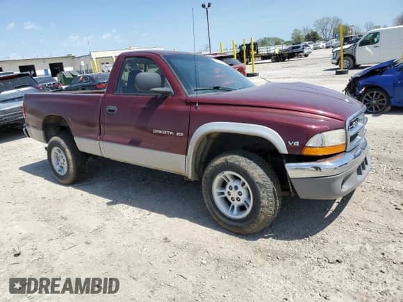 2000 Dodge Dakota Sport z VIN 1B7GG26N5YS546673, wystawiony jako Copart lot #54512715 z przebiegiem 140 904 mil mil oraz Czysty tytuł • Clean title. Historia ofert i sprzedaży dostępna na DreamBid. Obrazek 4.