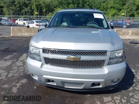 2011 Chevrolet Tahoe LTZ with VIN 1GNSKCE01BR231833, listed as a IAAI auction lot 43053303 with 247,341 mi miles and . Bid and sale history available at DreamBid. Image 6.