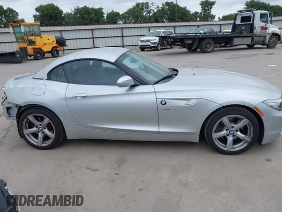 ✅ 2011 BMW Z4 sDrive30i • VIN: WBALM5C58BE378396 • Lot: 42428199. Listed on IAAI with 142,584 mi. Free auction sales archive from the USA and detailed vehicle history report at DreamBid. Image 14.