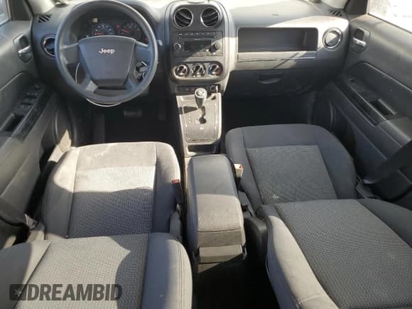 ✅ 2009 Jeep Patriot Sport • VIN: 1J4FT28A39D195618 • Lot: 71017635. Listed on Copart with 117,934 mi. Free auction sales archive from the USA and detailed vehicle history report at DreamBid. Image 8.