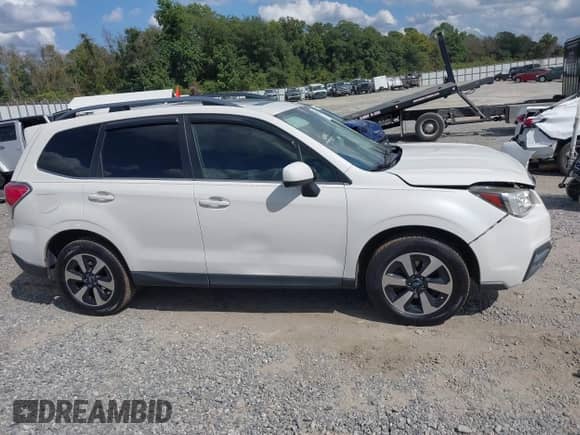 2017 Subaru Forester Limited with VIN JF2SJAJC1HH414553, listed as a IAAI auction lot 43289933 with 120,913 mi miles and . Bid and sale history available at DreamBid. Image 13.