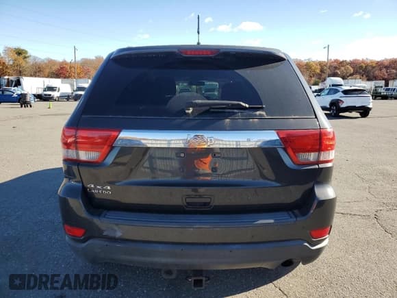 ✅ 2011 Jeep Grand Cherokee Laredo • VIN: 1J4RR4GG3BC584459 • Lot: 90755875. Wystawiony na Copart z przebiegiem 97 505 mil. Bezpłatny archiwum sprzedaży aukcyjnych z USA i szczegółowy raport historii pojazdu na DreamBid. Zdjęcie 6.