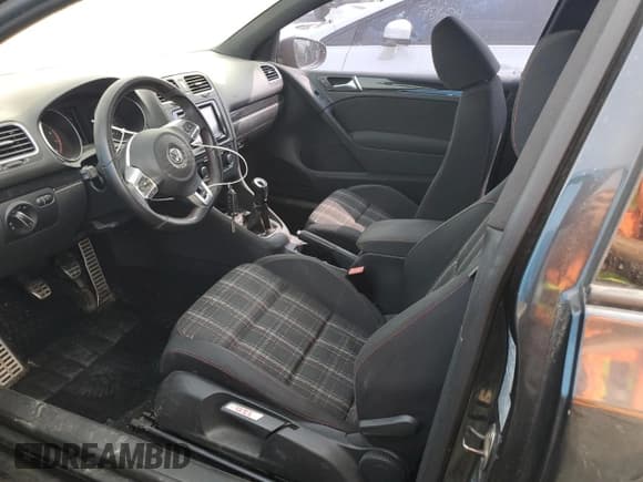 ✅ 2012 Volkswagen Golf GTI w/Conv & Sunroof • VIN: WVWEV7AJ7CW009478 • Lot: 58974025. Listed on Copart with 124,472 mi. Free auction sales archive from the USA and detailed vehicle history report at DreamBid. Image 7.