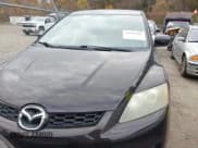 ✅ 2009 Mazda CX-7 Grand Touring • VIN: JM3ER29L890234234 • Lot: 43555381. Wystawiony na IAAI z przebiegiem 170 206 mil. Bezpłatny archiwum sprzedaży aukcyjnych z USA i szczegółowy raport historii pojazdu na DreamBid. Zdjęcie 12.