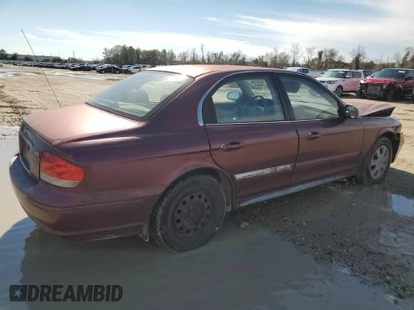 2002 Hyundai Sonata with VIN KMHWF25H62A642539, listed as a Copart auction lot 88089735 with 163,679 mi miles and Salvage title. Bid and sale history available at DreamBid. Image 3.