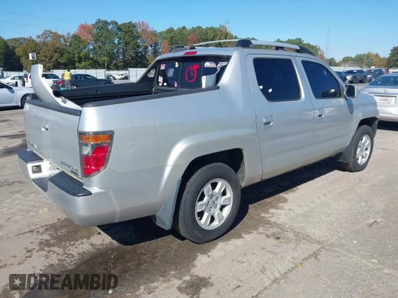 ✅ 2006 Honda Ridgeline RTL • VIN: 2HJYK16546H546208 • Lot: 43567939. Listed on IAAI with 206,460 mi. Free auction sales archive from the USA and detailed vehicle history report at DreamBid. Image 4.