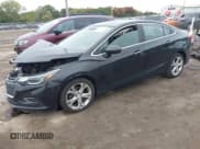 ✅ 2018 Chevrolet Cruze Premier • VIN: 1G1BF5SM1J7141701 • Lot: 43449111. Listed on IAAI with 128,825 mi. Free auction sales archive from the USA and detailed vehicle history report at DreamBid. Image 2.