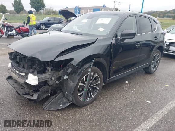 ✅ 2023 Mazda CX-5 S Premium Plus • VIN: JM3KFBEM6P0136505 • Лот: 43555805. Опубликован ранее на IAAI с пробегом 30 767 миль. Бесплатный доступ к архиву аукционных продаж из США и подробный отчёт об истории автомобиля на DreamBid. Изображение 19.