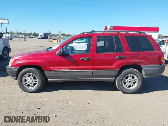✅ 2002 Jeep Grand Cherokee Laredo • VIN: 1J4GX48S62C257425 • Lot: 43435617. Listed on IAAI with 251,435 mi. Free auction sales archive from the USA and detailed vehicle history report at DreamBid. Image 14.