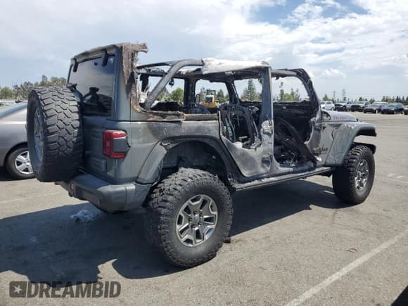 ✅ 2021 Jeep Wrangler Unlimited Rubicon • VIN: 1C4JJXFM9MW774562 • Lot: 70323125. Wystawiony na Copart z przebiegiem Nie podano. Bezpłatny archiwum sprzedaży aukcyjnych z USA i szczegółowy raport historii pojazdu na DreamBid. Zdjęcie 3.