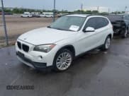 ✅ 2013 BMW X1 28i • VIN: WBAVM1C53DVW44816 • Лот: 42998838. Опубликован ранее на IAAI с пробегом 124 649 миль. Бесплатный доступ к архиву аукционных продаж из США и подробный отчёт об истории автомобиля на DreamBid. Изображение 2.