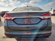 ✅ 2018 Ford Fusion SE • VIN: 3FA6P0LU8JR123976 • Lot: 93169985. Wystawiony na Copart z przebiegiem 144 015 mil. Bezpłatny archiwum sprzedaży aukcyjnych z USA i szczegółowy raport historii pojazdu na DreamBid. Zdjęcie 6.