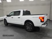 ✅ 2024 Ford F-150 Lightning XLT • VIN: 1FTVW3LKXRWG06404 • Lot: 84980215. Listed on Copart with 14,760 mi. Free auction sales archive from the USA and detailed vehicle history report at DreamBid. Image 2.