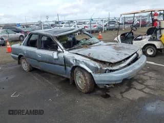 ✅ 1991 Toyota Camry • VIN: 4T1VV22E5MU065027 • Lot: 41919972. Listed on IAAI with 157,835 mi. Free auction sales archive from the USA and detailed vehicle history report at DreamBid. Image 1.
