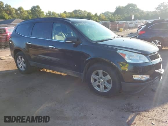 2010 Chevrolet Traverse 1LT z VIN 1GNLVFED5AS117261, wystawiony jako IAAI lot #43220575 z przebiegiem 257 124 mil mil oraz . Historia ofert i sprzedaży dostępna na DreamBid. Obrazek 1.