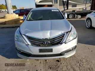 2015 Hyundai Azera z VIN KMHFG4JGXFA454022, wystawiony jako Copart lot #76517844 z przebiegiem 133 895 mil mil oraz Szkoda całkowita • Salvage title. Historia ofert i sprzedaży dostępna na DreamBid. Obrazek 5.