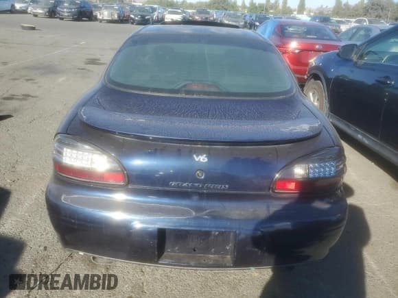 ✅ 2000 Pontiac Grand Prix GT • VIN: 1G2WP52K6YF289495 • Лот: 69342584. Опубликован ранее на Copart с пробегом 199 599 миль. Бесплатный доступ к архиву аукционных продаж из США и подробный отчёт об истории автомобиля на DreamBid. Изображение 6.