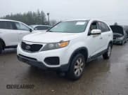 ✅ 2011 Kia Sorento LX • VIN: 5XYKTCA17BG010479 • Lot: 43923357. Listed on IAAI with 138,412 mi. Free auction sales archive from the USA and detailed vehicle history report at DreamBid. Image 2.