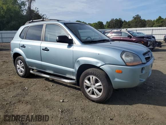 2009 Hyundai Tucson GLS with VIN KM8JM12B89U934874, listed as a Copart auction lot 71933114 with 134,770 mi miles and Salvage title. Bid and sale history available at DreamBid. Image 4.