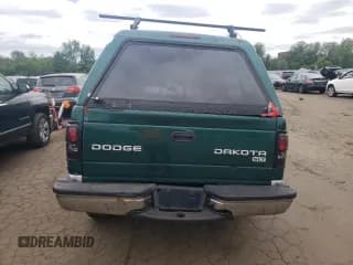 ✅ 2003 Dodge Dakota SLT • VIN: 1D7HG48N73S239498 • Lot: 57225245. Wystawiony na Copart z przebiegiem Nie podano. Bezpłatny archiwum sprzedaży aukcyjnych z USA i szczegółowy raport historii pojazdu na DreamBid. Zdjęcie 6.