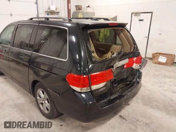 ✅ 2008 Honda Odyssey Touring • VIN: 5FNRL38958B017165 • Lot: 43575767. Listed on IAAI with 209,240 mi. Free auction sales archive from the USA and detailed vehicle history report at DreamBid. Image 6.
