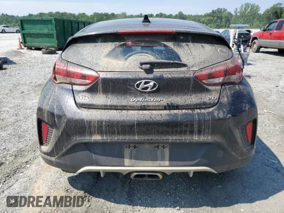 2020 Hyundai Veloster Premium с VIN KMHTG6AF8LU021704, выставлен на аукционе Copart как лот 61575535 с пробегом 80 451 миль миль и Списание • Salvage title. История ставок и продаж доступна на DreamBid. Изображение 6.
