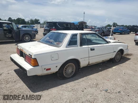 ✅ 1982 Datsun 200SX • VIN: JN1RS06SXCU629999 • Лот: 61341485. Опубликован ранее на Copart с пробегом 174 381 миль. Бесплатный доступ к архиву аукционных продаж из США и подробный отчёт об истории автомобиля на DreamBid. Изображение 3.
