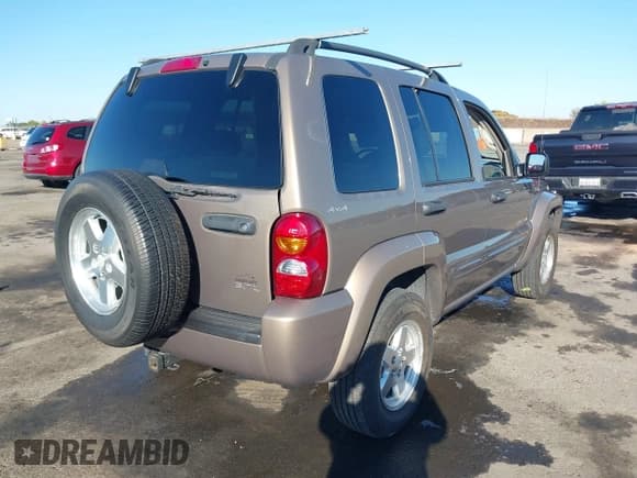 ✅ 2002 Jeep Liberty Limited • VIN: 1J4GL58K12W203787 • Lot: 43482653. Listed on IAAI with 122,973 mi. Free auction sales archive from the USA and detailed vehicle history report at DreamBid. Image 4.