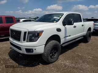 ✅ 2018 Nissan Titan Platinum Reserve • VIN: 1N6BA1F45JN528964 • Lot: 62143025. Wystawiony na Copart z przebiegiem Nie podano. Bezpłatny archiwum sprzedaży aukcyjnych z USA i szczegółowy raport historii pojazdu na DreamBid. Zdjęcie 1.