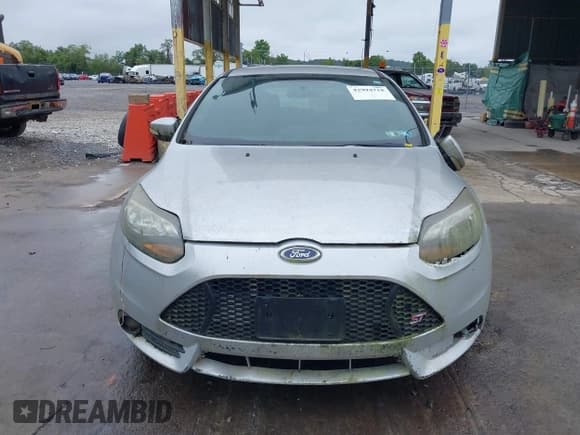 ✅ 2013 Ford Focus ST • VIN: 1FADP3L9XDL127468 • Lot: 42994718. Listed on IAAI with 123,988 mi. Free auction sales archive from the USA and detailed vehicle history report at DreamBid. Image 12.