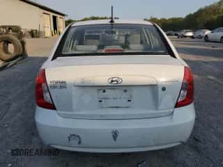 2010 Hyundai Accent GLS z VIN KMHCN4AC6AU488049, wystawiony jako Copart lot #75496004 z przebiegiem 115 723 mil mil oraz Szkoda całkowita • Salvage title. Historia ofert i sprzedaży dostępna na DreamBid. Obrazek 6.