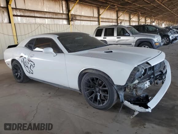 ✅ 2011 Dodge Challenger • VIN: 2B3CJ4DG7BH596975 • Lot: 42222095. Wystawiony na Copart z przebiegiem 190 592 mil. Bezpłatny archiwum sprzedaży aukcyjnych z USA i szczegółowy raport historii pojazdu na DreamBid. Zdjęcie 4.