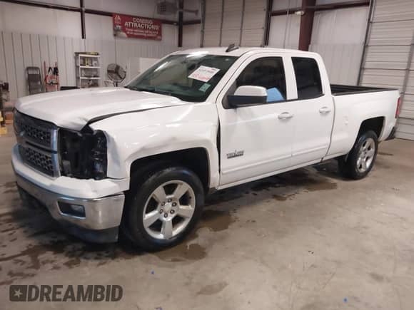 2015 Chevrolet Silverado 1500 LT z VIN 1GCRCREH0FZ398560, wystawiony jako IAAI lot #42454940 z przebiegiem 158 025 mil mil oraz . Historia ofert i sprzedaży dostępna na DreamBid. Obrazek 23.