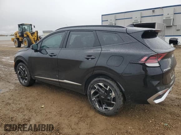 ✅ 2025 Kia Sportage SX-Prestige • VIN: 5XYK5CDF9SG256869 • Лот: 55262095. Опубликован ранее на Copart с пробегом 13 210 миль. Бесплатный доступ к архиву аукционных продаж из США и подробный отчёт об истории автомобиля на DreamBid. Изображение 2.