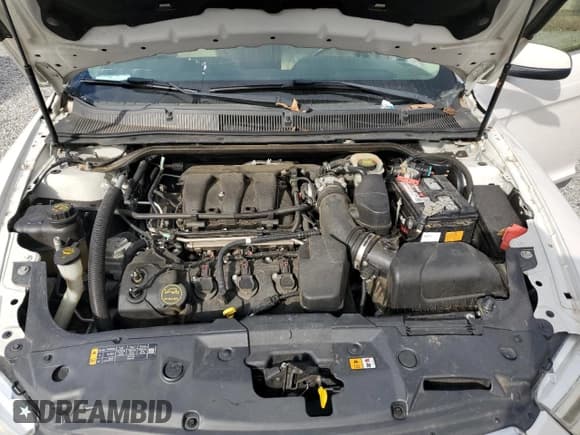 ✅ 2014 Ford Taurus SEL • VIN: 1FAHP2E85EG181674 • Lot: 91808235. Listed on Copart with 137,964 mi. Free auction sales archive from the USA and detailed vehicle history report at DreamBid. Image 11.