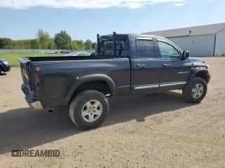 2006 Dodge 1500 SLT z VIN 1D7HU18236S636658, wystawiony jako Copart lot #74523544 z przebiegiem 174 237 mil mil oraz Szkoda całkowita • Salvage title. Historia ofert i sprzedaży dostępna na DreamBid. Obrazek 3.