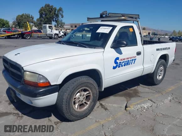 2002 Dodge Dakota with VIN 1B7FL36N32S507116, listed as a IAAI auction lot 42990993 with Not provided miles and . Bid and sale history available at DreamBid. Image 2.