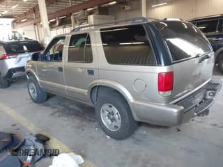 ✅ 2004 Chevrolet Blazer LS • VIN: 1GNDT13X44K102362 • Lot: 41944259. Wystawiony na IAAI z przebiegiem 119 296 mil. Bezpłatny archiwum sprzedaży aukcyjnych z USA i szczegółowy raport historii pojazdu na DreamBid. Zdjęcie 3.