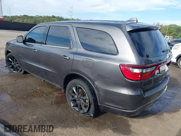 2018 Dodge Durango SXT with VIN 1C4RDJAGXJC291300, listed as a IAAI auction lot 43309283 with 92,879 mi miles and . Bid and sale history available at DreamBid. Image 3.