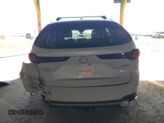 ✅ 2024 Mazda CX-90 S Premium Plus • VIN: JM3KKEHC9R1130873 • Lot: 82481895. Wystawiony na Copart z przebiegiem 27 442 mil. Bezpłatny archiwum sprzedaży aukcyjnych z USA i szczegółowy raport historii pojazdu na DreamBid. Zdjęcie 6.