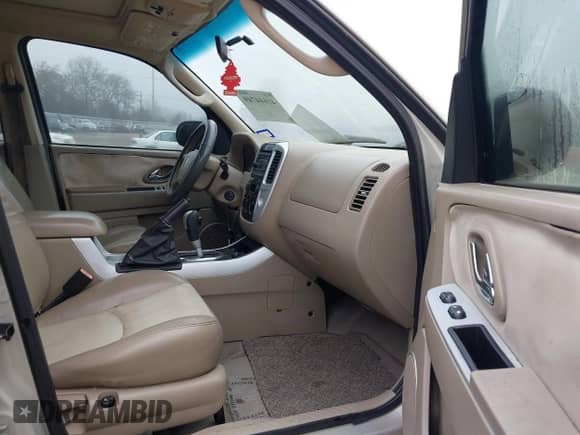 2005 Mercury Mariner Luxury z VIN 4M2YU56175DJ10333, wystawiony jako IAAI lot #41644749 z przebiegiem 174 477 mil mil oraz . Historia ofert i sprzedaży dostępna na DreamBid. Obrazek 5.