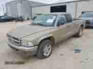 2002 Dodge Dakota SLT с VIN 1B7GL42N42S570015, выставлен на аукционе IAAI как лот 41339483 с пробегом 122 182 миль миль и . История ставок и продаж доступна на DreamBid. Изображение 2.